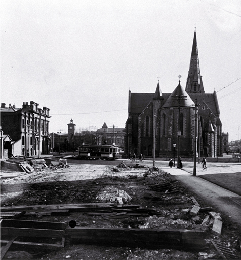 Rear of the Cathedral taken from the cleared site of the Tramway offices (now Government Buildings), Christchurch : at left is the Dalgety building. Rear of the Cathedral taken from the cleared site of the Tramway offices (now Government Buildings), Christchurch : at left is the Dalgety building.