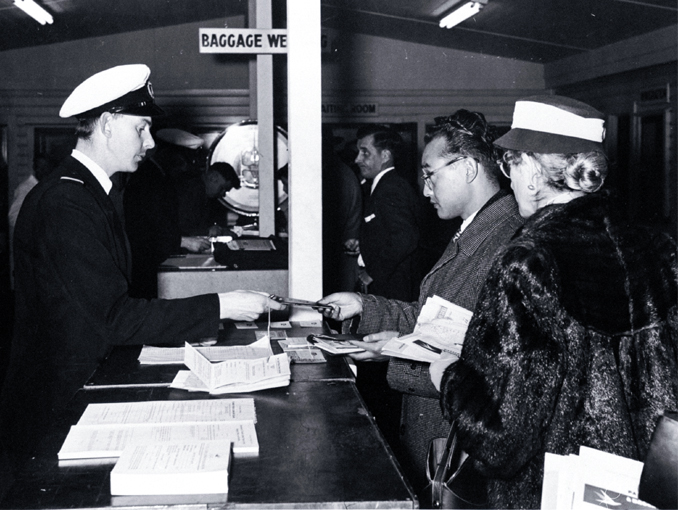 Passengers checking in at the old overseas terminal, Christchurch International Airport Passengers checking in at the old overseas terminal, Christchurch International Airport