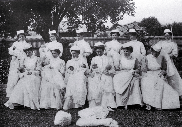 A group of St. Helen's nurses with their charges A group of St. Helen's nurses with their charges