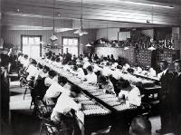 Clerks sort through the ballots before drawing the first ballot in the General Election of 1914