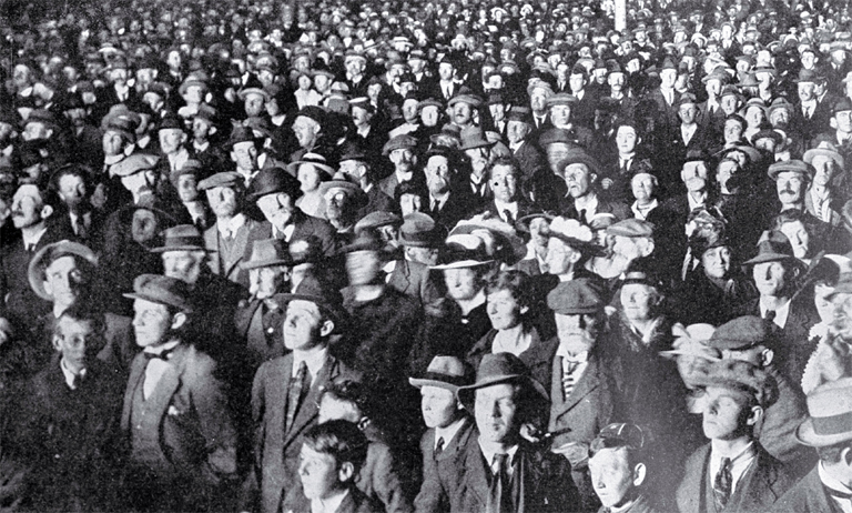 A portion of the crowd awaiting the result of the 1919 election, the results being displayed by lantern on a board in Christchurch A portion of the crowd awaiting the result of the 1919 election, the results being displayed by lantern on a board in Christchurch