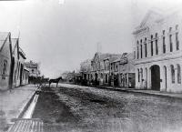 A horse and cart in Manchester Street, looking towards the Avon River, Christchurch 