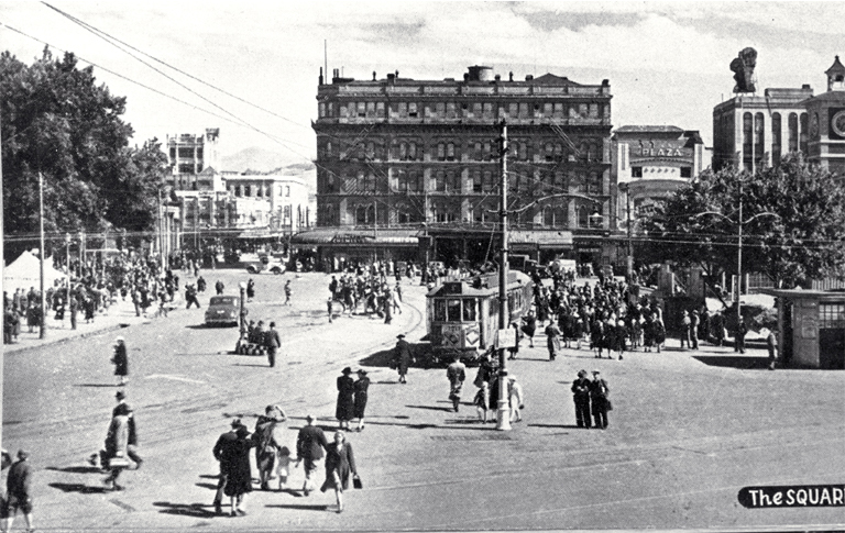 Pedestrians and a tram in Cathedral Square, Christchurch Pedestrians and a tram in Cathedral Square, Christchurch