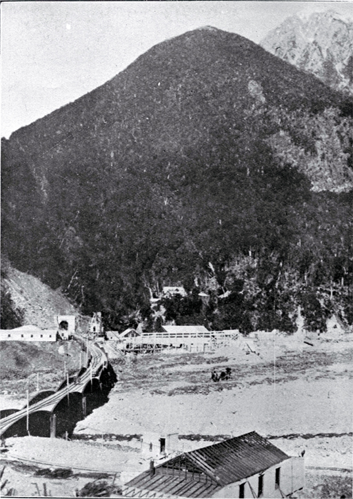 Otira portal to the Arthur's Pass tunnel with Rolleston Spur in the background and Rolleston River in the foreground Otira portal to the Arthur's Pass tunnel with Rolleston Spur in the background and Rolleston River in the foreground